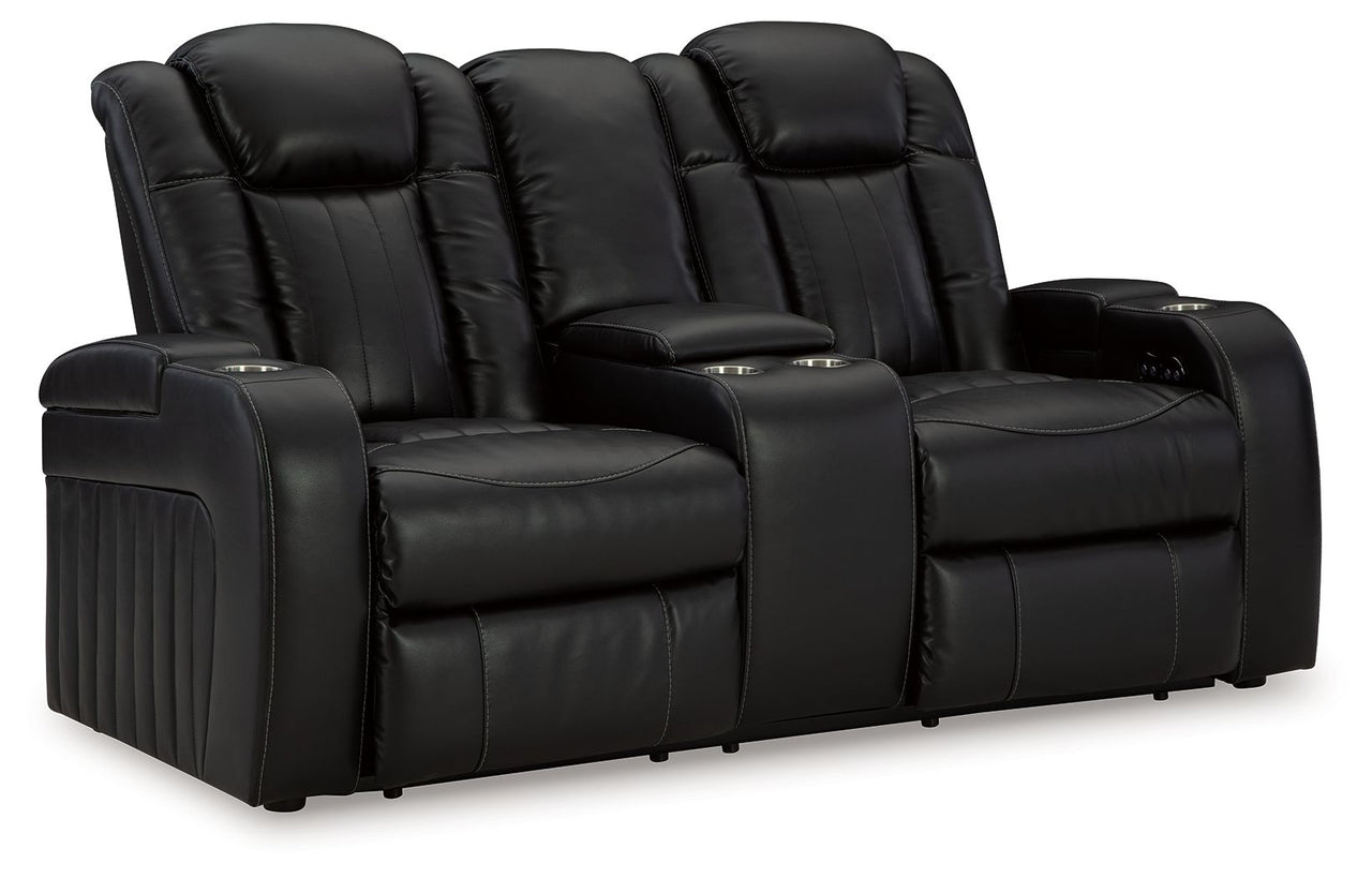 Caveman Den - Power Reclining Loveseat with Console/ Adj Hdrst - Midnight