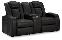 Caveman Den - Power Reclining Loveseat with Console/ Adj Hdrst - Midnight