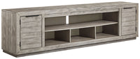 Naydell - XL TV Stand w/Fireplace Option - Gray